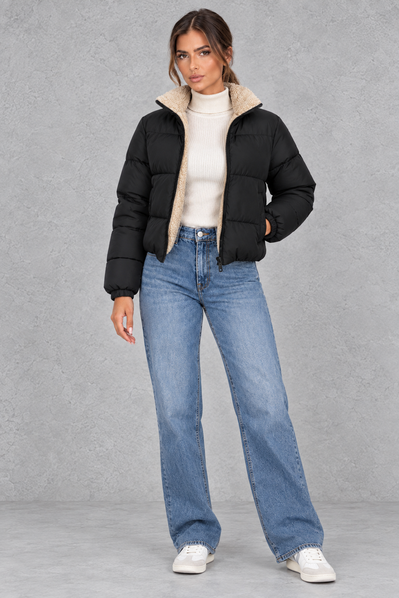 Women’s padded puffer jacket with a soft sherpa-lined high neck, horizontal quilting, full zip front and elasticated cuffs.