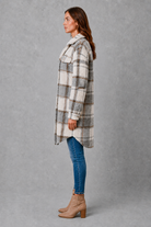 Women’s soft plush check jacket with button-front fastening and cosy teddy-style texture for autumn and winter.