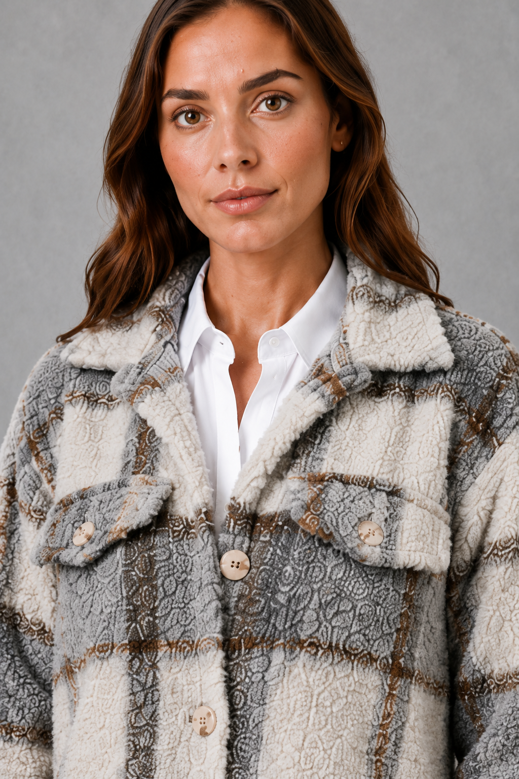 Women’s soft plush check jacket with button-front fastening and cosy teddy-style texture for autumn and winter.