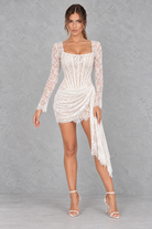 Women’s strapless lace evening dress with delicate lace detailing, sheer patchwork, a defined high waist and sleek fitted silhouette.