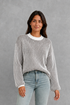 Women’s  striped knit jumper with a relaxed fit, drop shoulders, crew neckline and long sleeves.