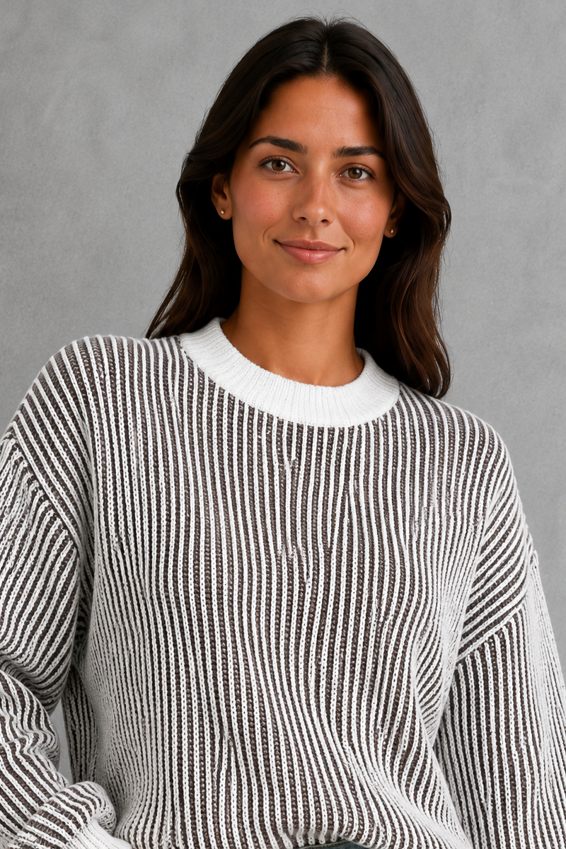 Women’s  striped knit jumper with a relaxed fit, drop shoulders, crew neckline and long sleeves.