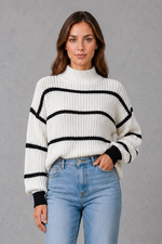 Women’s striped mock neck knit jumper with long sleeves, relaxed dropped shoulders and a cosy casual fit for autumn and winter.