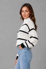 Women’s striped mock neck knit jumper with long sleeves, relaxed dropped shoulders and a cosy casual fit for autumn and winter.