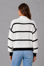Women’s striped mock neck knit jumper with long sleeves, relaxed dropped shoulders and a cosy casual fit for autumn and winter.