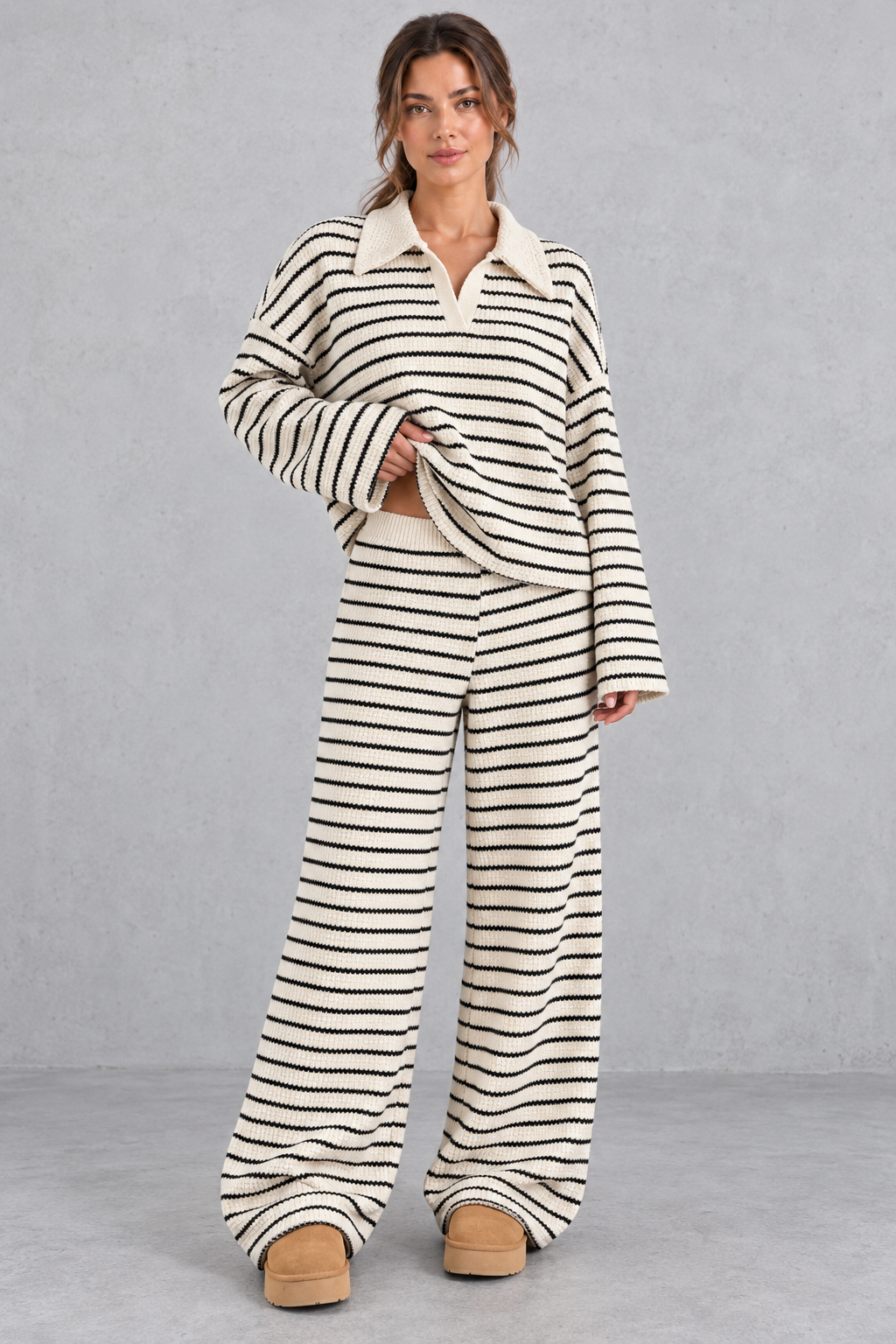 Women's beige striped knit co-ord set with collared V-neck top and wide leg trousers – front view