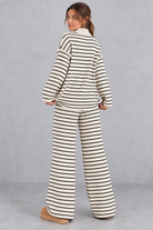 Women's beige striped knit co-ord set with collared V-neck top and wide leg trousers – back view