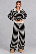 Women's black striped knit co-ord set with cream collar and wide leg trousers – front view
