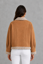 Women’s suede-look teddy coat with a relaxed fit, cosy texture, long sleeves and classic lapel collar.