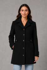 Women’s tailored longline coat with a classic collar, button-front fastening, defined waist, decorative waist tabs and button cuff detailing.
