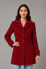Women’s tailored longline coat with a classic collar, button-front fastening, defined waist, decorative waist tabs and button cuff detailing.
