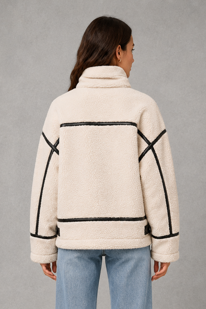 Women’s teddy borg coat with a soft plush texture, relaxed silhouette and practical zip-up front for cosy autumn and winter layering.