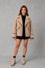 Women’s teddy fleece jacket with a relaxed fit, soft borg texture, turn-down collar and open-front design.