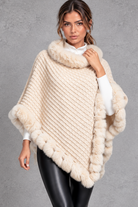 Women's textured knitted poncho in Cream – front view