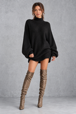 Women's black oversized turtleneck knit jumper mini dress with long balloon sleeves – front view