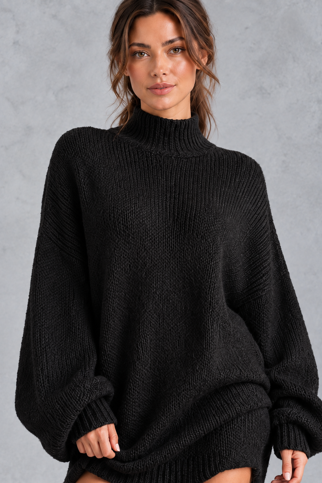 Women's black oversized turtleneck jumper dress – close-up of turtleneck and knit texture