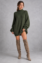 Women's army green oversized turtleneck knit jumper mini dress with long balloon sleeves – front view