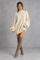 Women's off white oversized turtleneck knit jumper mini dress with long balloon sleeves – front view