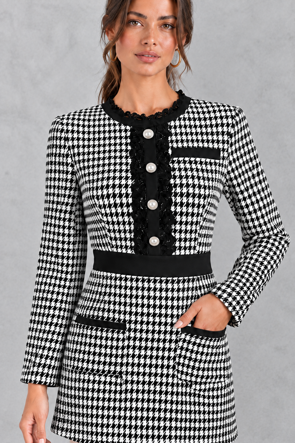 Women’s tweed bodycon mini dress with long sleeves, lace trim, round neckline and decorative button detailing.