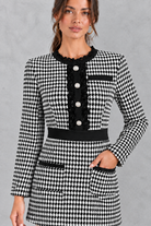 Women’s tweed bodycon mini dress with long sleeves, lace trim, round neckline and decorative button detailing.