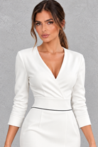 Women’s V-neck midi dress with a sleek slim-fit silhouette, solid-colour finish and elegant statement split detail.