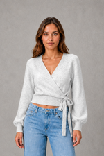Women’s V-neck wrap knit jumper with long sleeves, crossover front and adjustable tie waist bow.