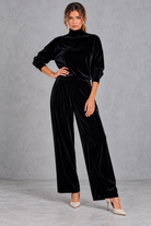 Women's black velvet high neck top and wide leg trouser set – front view