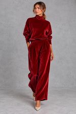 Women's red velvet high neck top and wide leg trouser set – front view