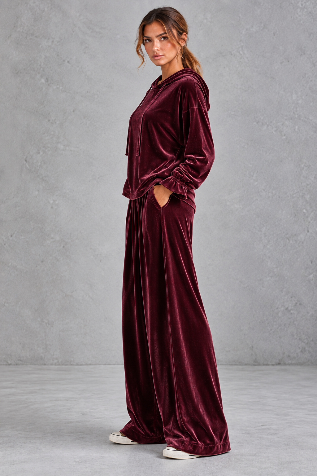 Women's burgundy velvet hoodie and wide leg trouser set – side view