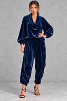 Women's navy blue velvet cowl neck top and harem trouser set – front view