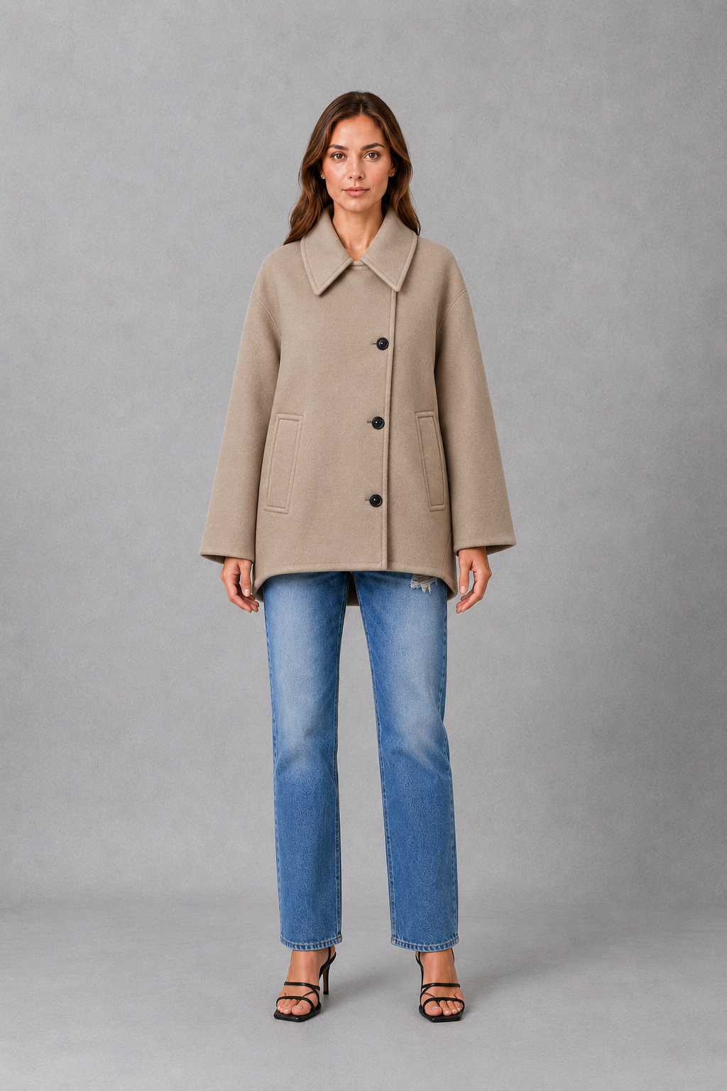Women’s vintage casual longline coat with a relaxed silhouette, practical front pockets and timeless retro-inspired styling for cooler weather.