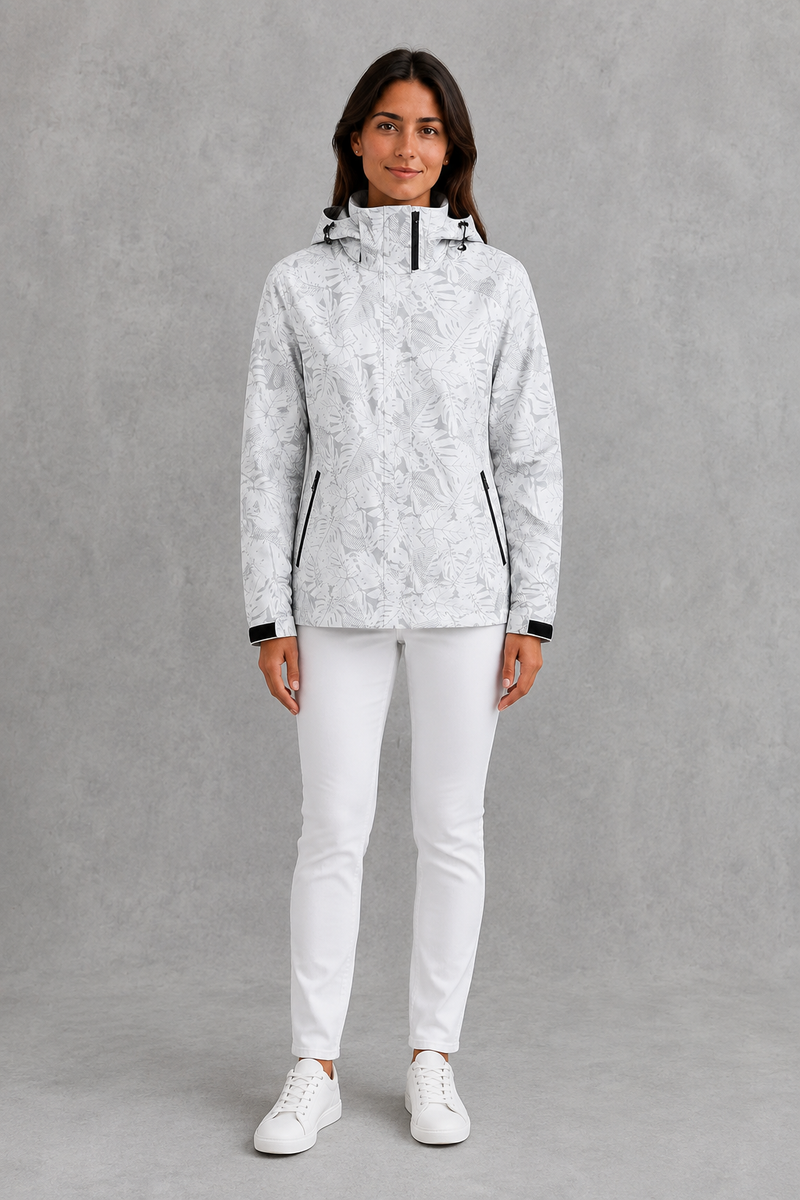 Women’s waterproof leaf print jacket with a protective hood, adjustable drawstring waist and lightweight design for rainy and changeable weather.