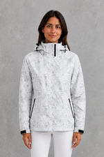 Women’s waterproof leaf print jacket with a protective hood, adjustable drawstring waist and lightweight design for rainy and changeable weather.