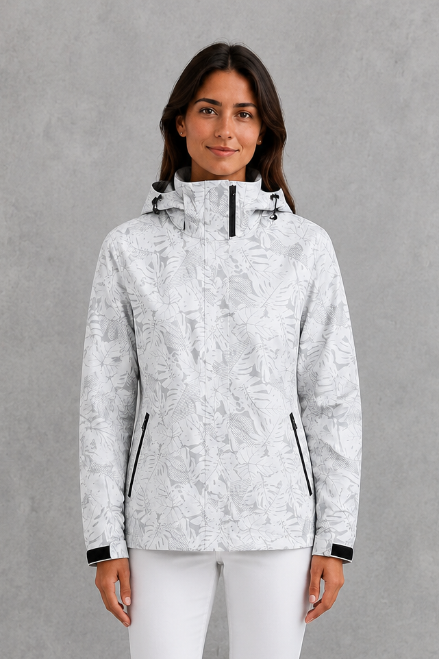Women’s waterproof leaf print jacket with a protective hood, adjustable drawstring waist and lightweight design for rainy and changeable weather.