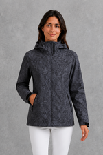 Women’s waterproof leaf print jacket with a protective hood, adjustable drawstring waist and lightweight design for rainy and changeable weather.