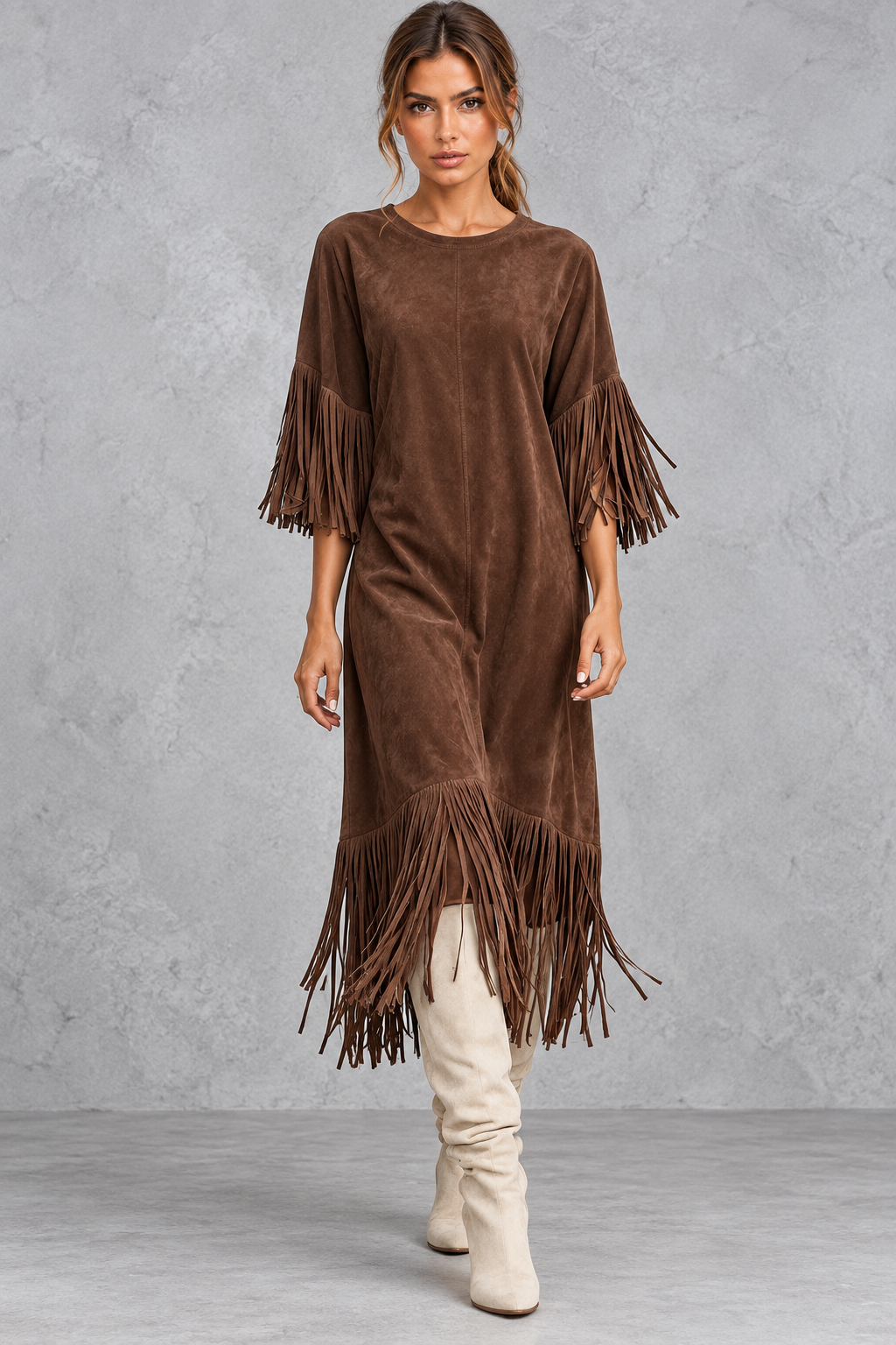 Women’s Western faux suede midi dress with a round neckline, decorative tassel detailing and a relaxed A-line silhouette.