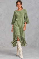 Women’s Western faux suede midi dress with a round neckline, decorative tassel detailing and a relaxed A-line silhouette.
