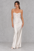 Women’s white lace satin maxi dress with delicate shoulder straps, lace-spliced detailing, a smooth satin-look finish and statement open back.