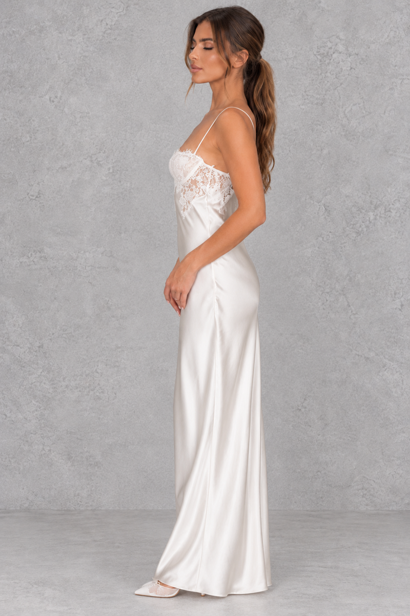 Women’s white lace satin maxi dress with delicate shoulder straps, lace-spliced detailing, a smooth satin-look finish and statement open back.