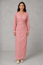 Women’s wrap maxi dress with a V-neckline, ruched side waist, long cuffed sleeves, flowing full-length skirt and subtle side slit.