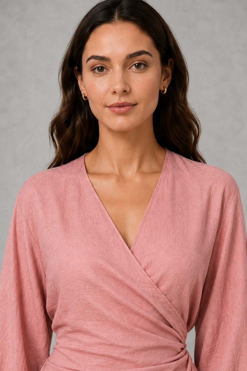 Women’s wrap maxi dress with a V-neckline, ruched side waist, long cuffed sleeves, flowing full-length skirt and subtle side slit.