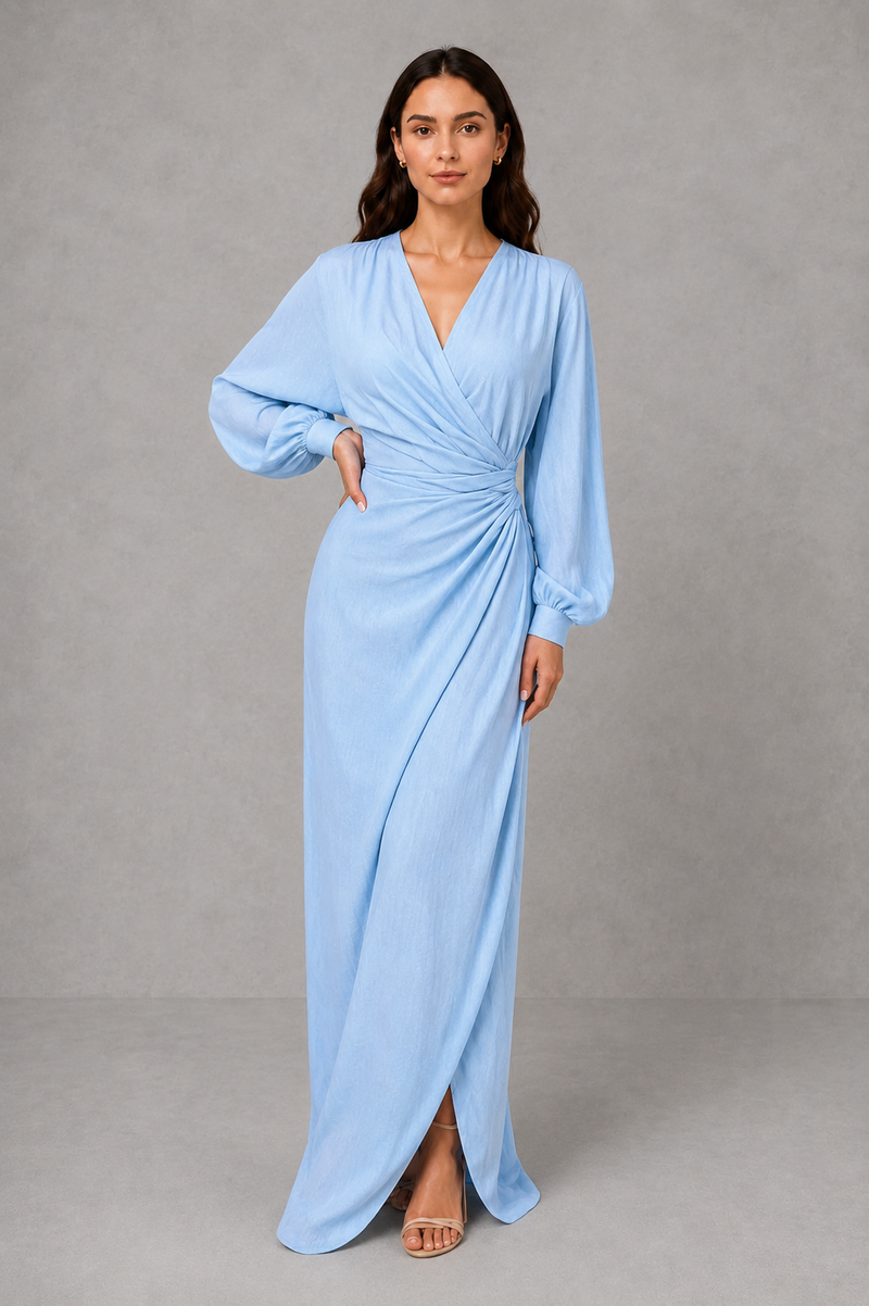 Women’s wrap maxi dress with a V-neckline, ruched side waist, long cuffed sleeves, flowing full-length skirt and subtle side slit.