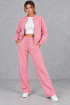 Women's zip-up jacket & trousers set in Pink – front view