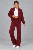 Women's zip-up jacket & trousers set in Burgundy – front view