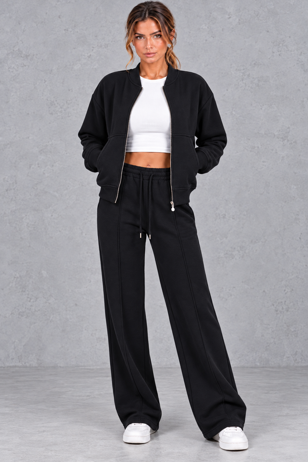 Women's zip-up jacket & trousers set in Black – front view