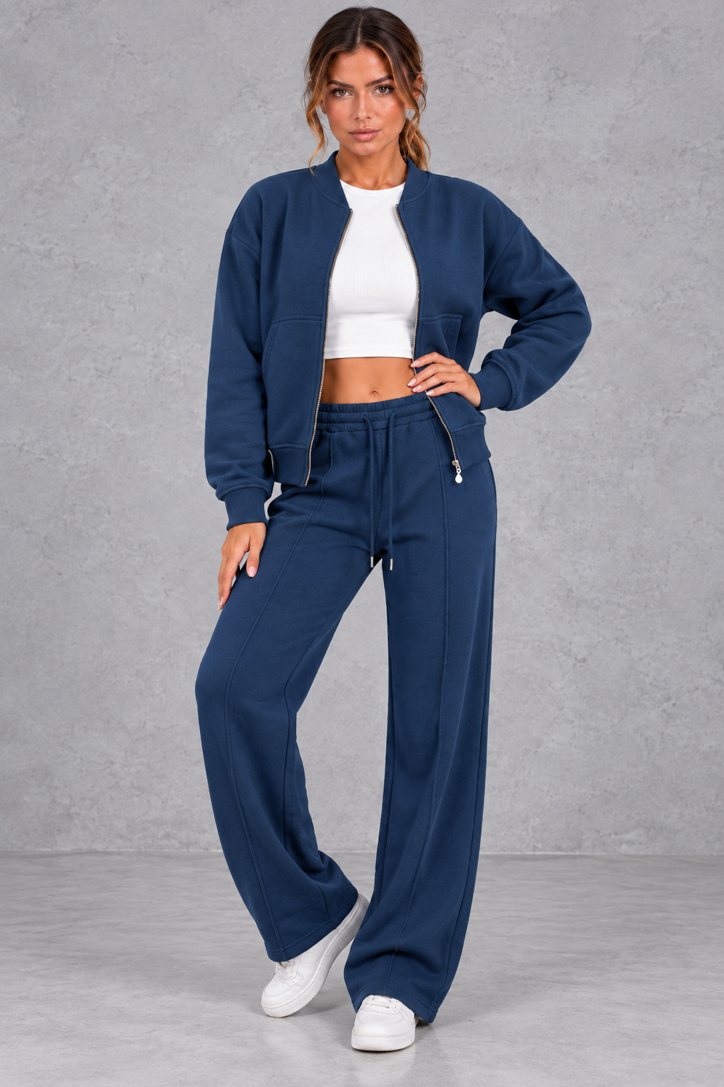Women's zip-up jacket & trousers set in Navy – front view