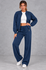 Women's zip-up jacket & trousers set in Navy – front view