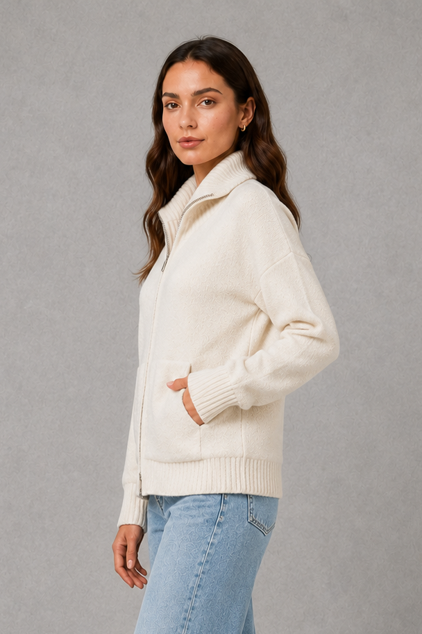 Women’s zip up knit cardigan with a cosy funnel neck, relaxed fit, long sleeves, ribbed trims and practical front patch pockets.