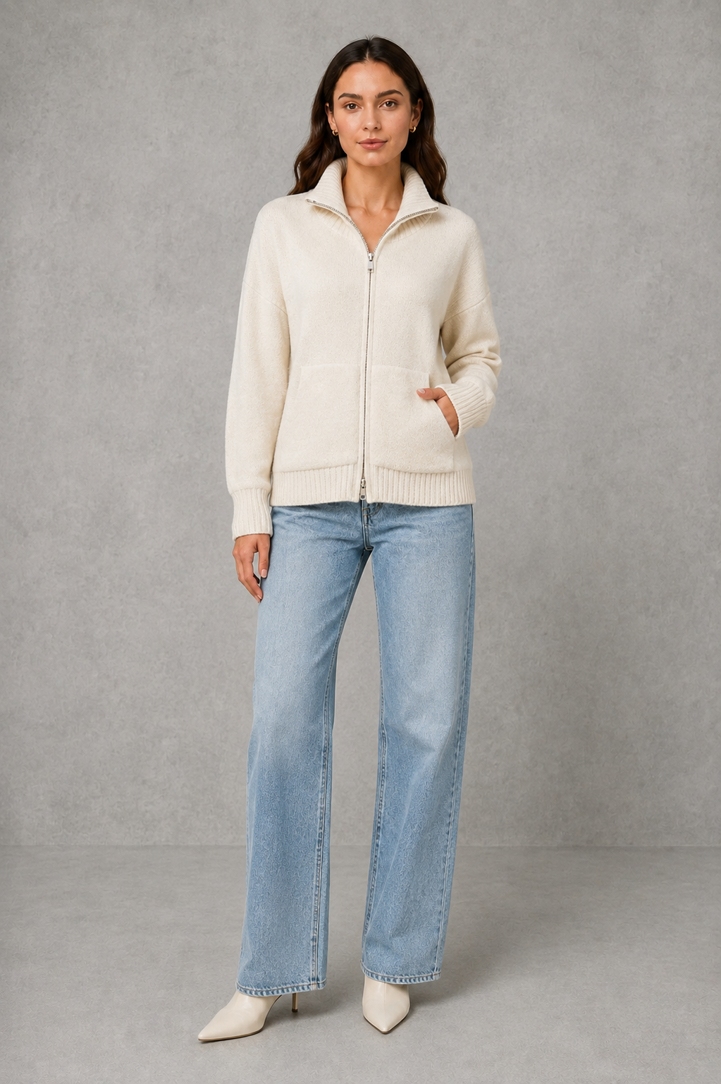 Women’s zip up knit cardigan with a cosy funnel neck, relaxed fit, long sleeves, ribbed trims and practical front patch pockets.