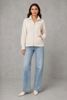 Women’s zip up knit cardigan with a cosy funnel neck, relaxed fit, long sleeves, ribbed trims and practical front patch pockets.